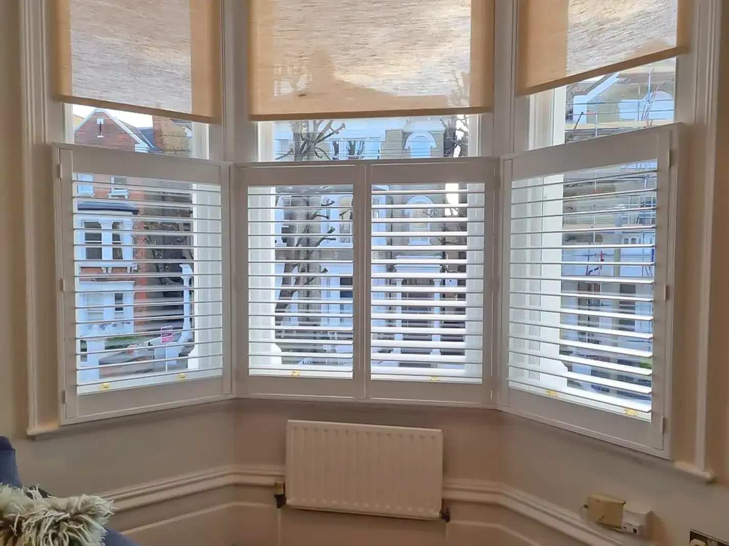 Café Style shutters across a bay window